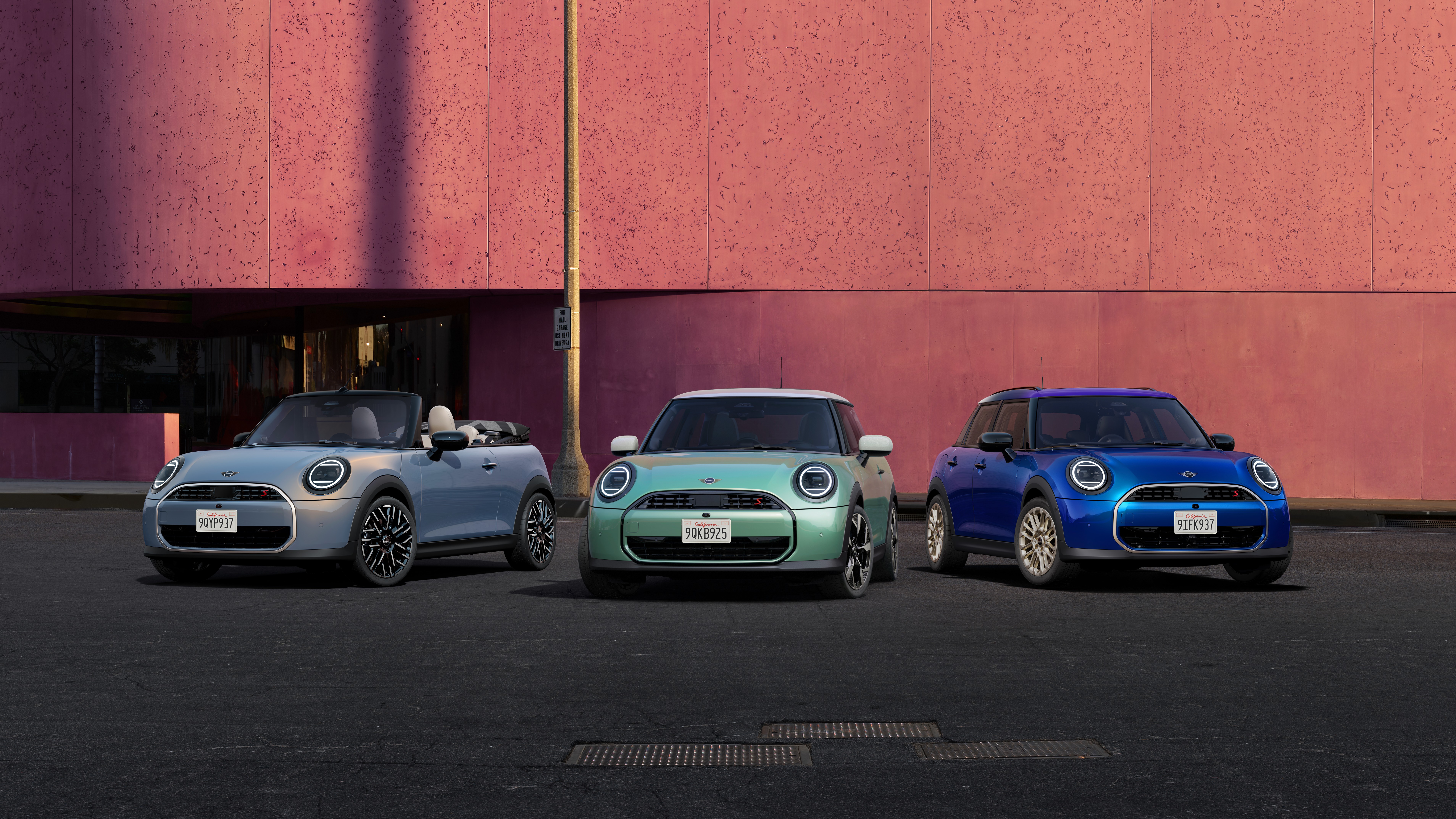 MINI Countryman parked off-road near hills